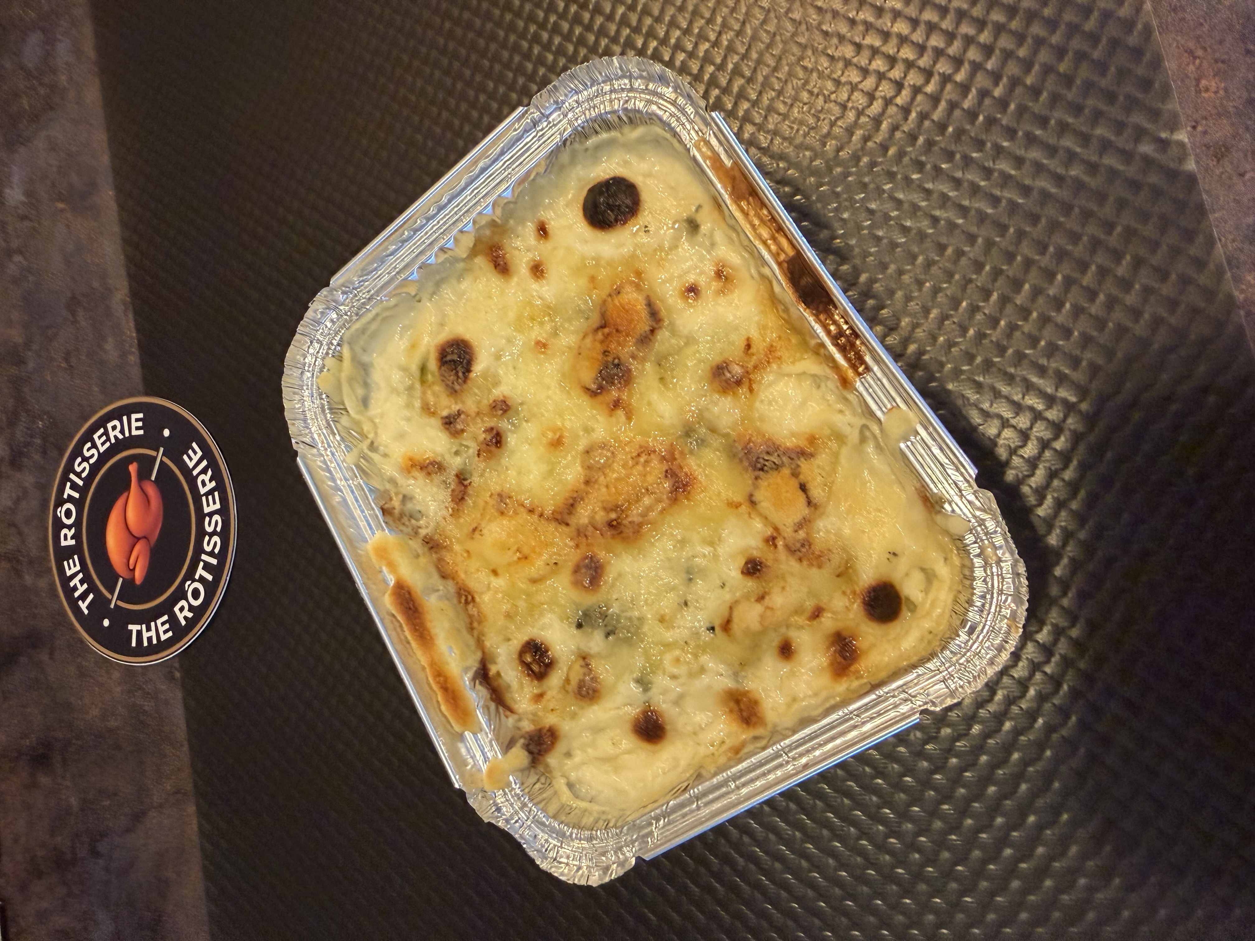 Raviole gratiné roquefort une barquette ( 1 part )